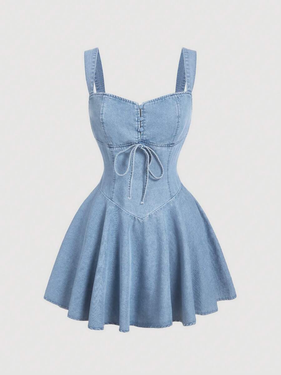 Elevate your casual wardrobe with this trendy blue denim mini slip dress. Crafted from a comfortable cotton-blend fabric (60% cotton, 25% polyester, 15% viscose), this sleeveless style features a high-waist silhouette with contrast lace detailing and a lace-up front for an effortlessly chic look. The fitted bodycon cut flatters your figure while the flared hem adds movement and dimension. Perfect for dating or festival season, this light-wash denim dress transitions seamlessly from day to night. 