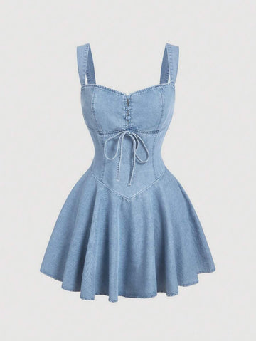 Elevate your casual wardrobe with this trendy blue denim mini slip dress. Crafted from a comfortable cotton-blend fabric (60% cotton, 25% polyester, 15% viscose), this sleeveless style features a high-waist silhouette with contrast lace detailing and a lace-up front for an effortlessly chic look. The fitted bodycon cut flatters your figure while the flared hem adds movement and dimension. Perfect for dating or festival season, this light-wash denim dress transitions seamlessly from day to night. 