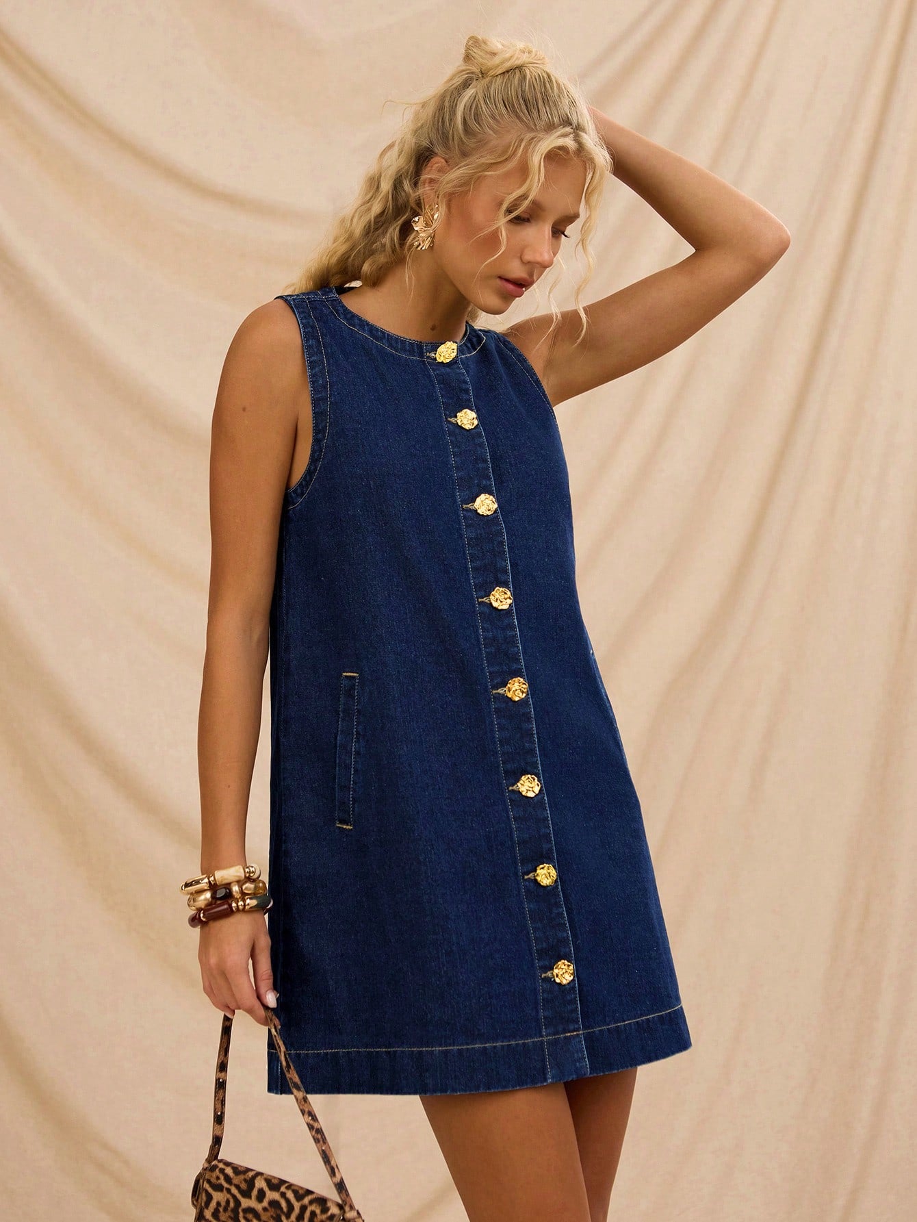 Step into summer fun with this trendy blue loose denim mini dress! Its breezy fit keeps you cool and comfy, making it ideal for beach vacations, festive parties, or even prom nights. The playful design adds a fresh twist to your wardrobe, perfect for dancing the day or night away in style.
