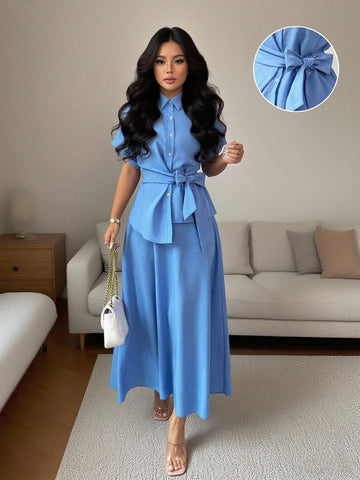 Elevate your warm-weather wardrobe with this breezy two-piece set designed for effortless style. The relaxed short-sleeve top pairs perfectly with the flattering half skirt, creating a versatile look that transitions seamlessly from casual hangouts to weekend adventures. Crafted in a cool blue hue that complements any complexion, this set strikes the perfect balance between comfort and trendiness. Whether you're catching up with friends or exploring the city, you'll feel confident and put-together in this s