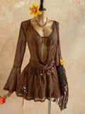 Elevate your summer wardrobe with this stunning brown mini dress featuring a daring plunging neckline and graceful flare sleeves. The A-line silhouette with high waist creates a flattering, feminine shape, while asymmetrical details and a ruffled hem add visual interest. Crafted from a soft knitted fabric blend with high stretch, this semi-sheer dress offers comfort and movement. Perfect for beach outings, festivals, or casual summer occasions, it's the effortless piece you'll reach for again and again. Mac