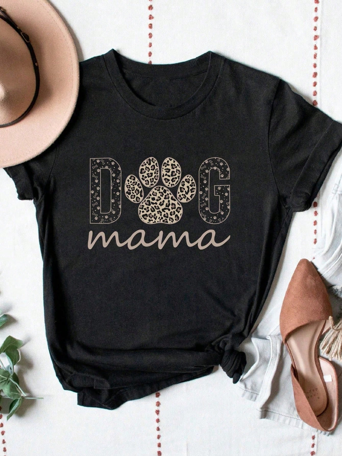 "Roar" into the dog park with this trendy cheetah print tee, perfect for all the proud dog moms out there! Show off your love for your fur baby in style. Makes a great gift for any dog lover, or treat yourself to this playful shirt. Woof! (Pun intended.)