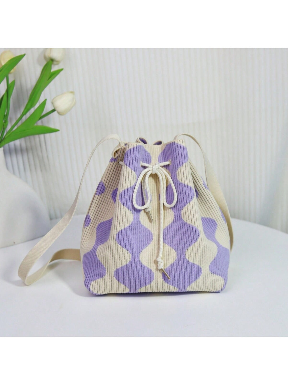 This trendy color-blocking crochet cross body bag is the perfect Mother's Day gift for mommy's essentials. With its eye-catching design and practical size, it's both stylish and functional. Keep all your essentials organized and easily accessible while on the go. Treat yourself or surprise your mom with this must-have accessory!