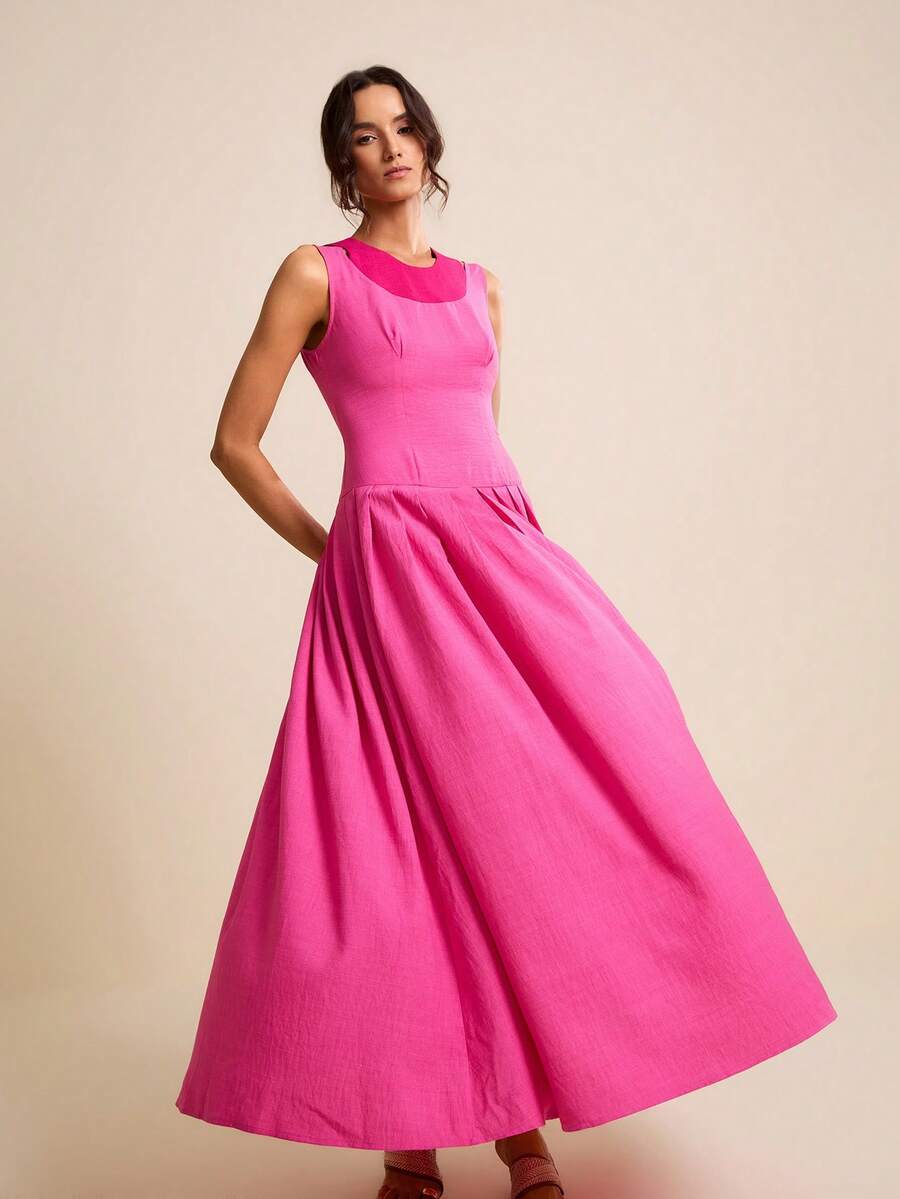 Experience the breathtaking fusion of mid-century pop-art heritage and sharp, modern architectural tailoring. This stunning pink and fuchsia ensemble is meticulously designed for the woman who values a high-fashion, "quiet luxury" approach to seasonal dressing—the ultimate centerpiece for prestigious coastal retreats, exclusive garden parties, and high-authority summer social gatherings.