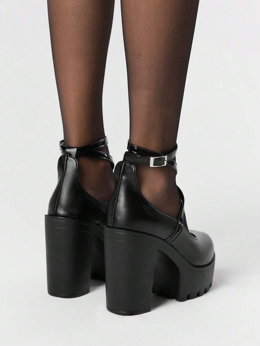 Step up your style game with these Trendy Goth Platform Mary Jane Shoes! Featuring bold cross straps and thick heels, they add a daring edge to any outfit. Perfect for women who love a mix of classic charm and bold attitude, these shoes bring comfort and confidence to every step. Embrace your dark side with flair and stand out wherever you go!