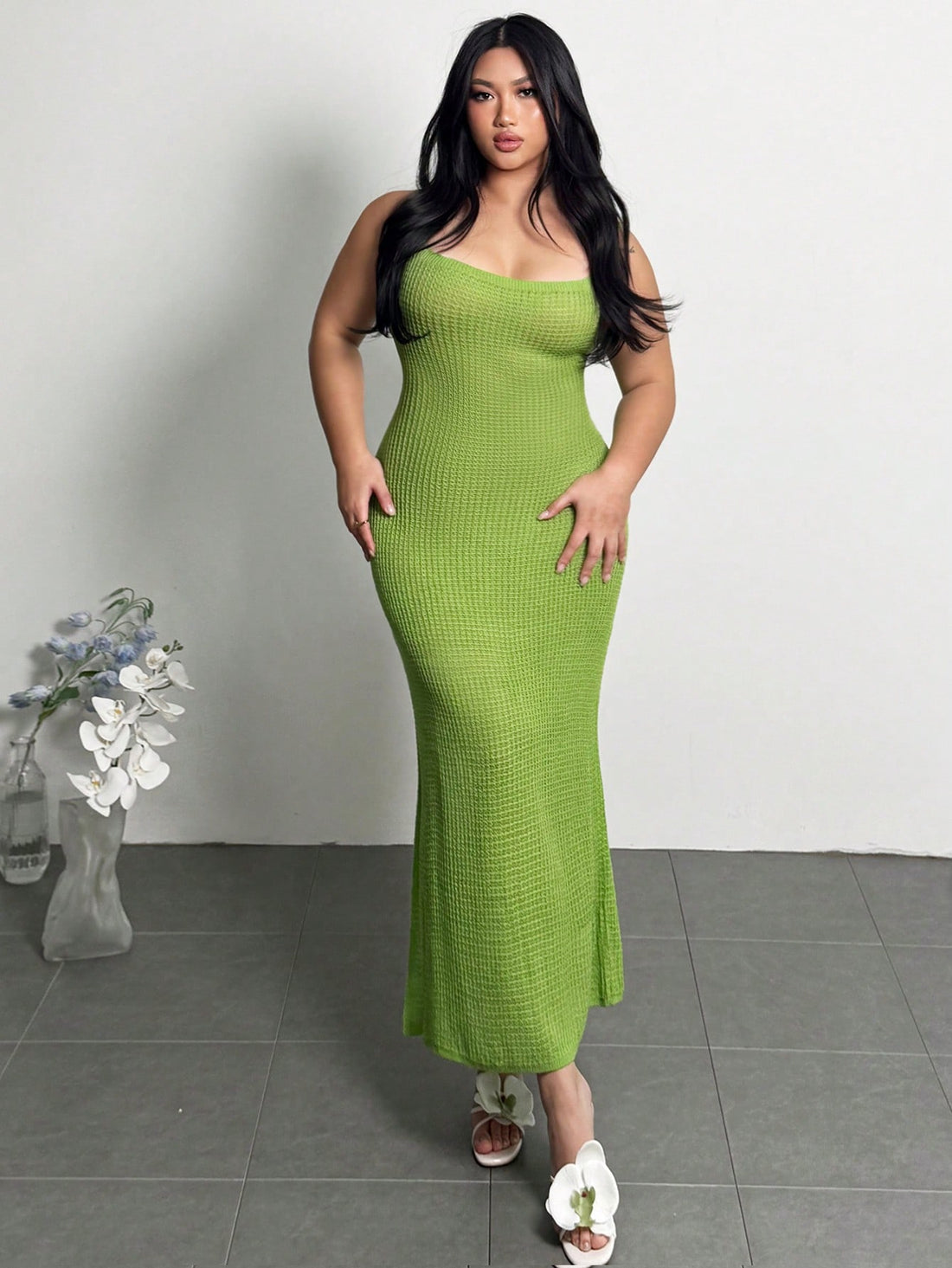 Get ready to turn heads with this playful summer duo! The Trendy Green Hollow Out Casual Elegance set features breezy beachside pants and a flirty slip dress, perfect for sun-soaked days and warm nights. The hollow-out details add a hint of allure while keeping things fresh and cool. Whether strolling the boardwalk or sipping cocktails by the shore, this vibrant green ensemble blends comfort and style effortlessly. Embrace carefree vibes with a look that’s as fun as your summer plans!