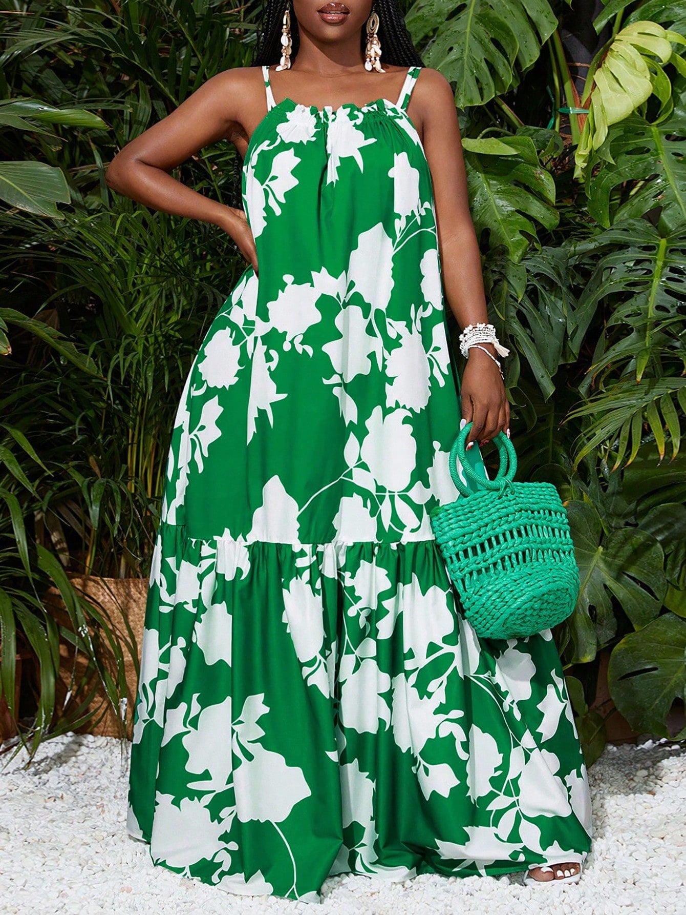 Get ready to stand out in this trendy Green Plant Print Thin Suspender A-Hem Dress! Perfect for summer vacations, its playful design is sure to catch some attention. Made with lightweight material, you'll stay cool while looking stylish. Don't miss out on adding this quirky piece to your wardrobe!