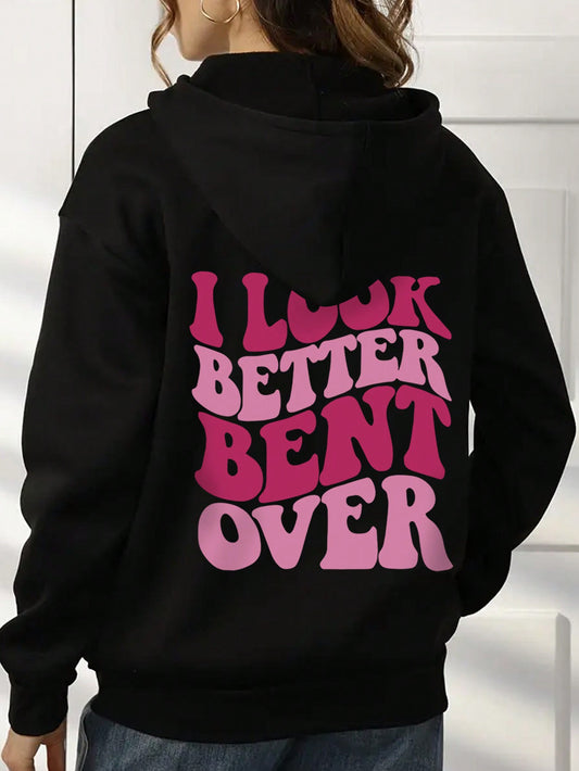 Introducing the Trendy Hooded Fleece Sweatshirt with a bold slogan print: 'I LOOK BETTER BENT OVER'. Stay comfortable and stylish with this ultra-soft sweatshirt, perfect for a casual day out or lounging at home. Make a statement with the trendy hood and stay warm with the fleece material.