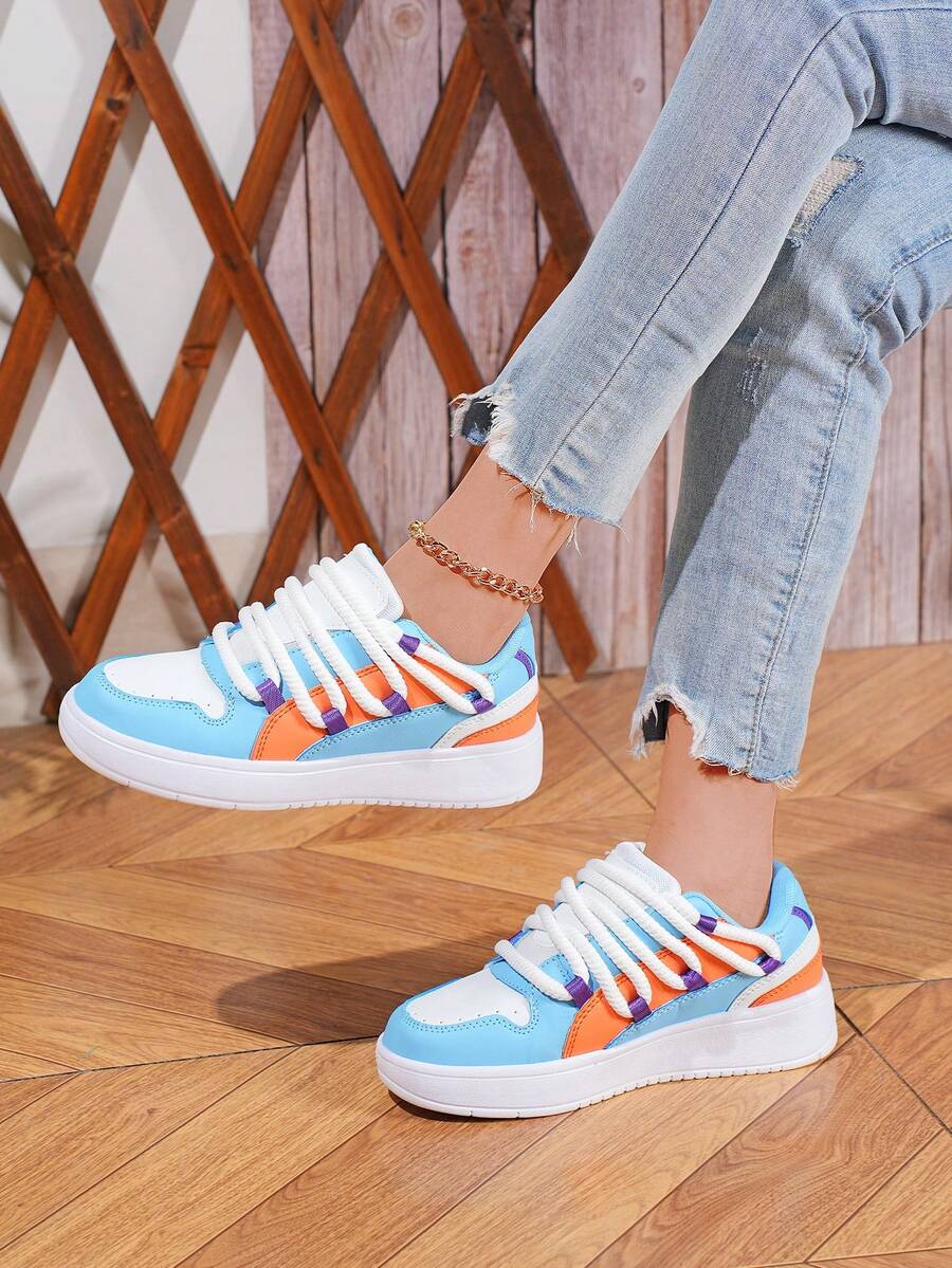 Step into style with these versatile lace-up sneakers that effortlessly transition from morning commutes to weekend explorations. The soft beige and blue colorway pairs with everything in your wardrobe, while the low-top silhouette keeps things casual and comfortable. Designed for all-day wear, these sneakers feature a supportive sole perfect for city streets and outdoor trails alike. Whether you're dashing through town or embarking on your next adventure, these go-to kicks deliver the comfort and flair you