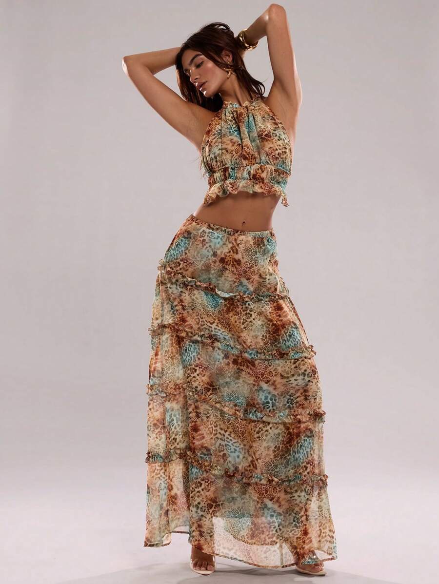 Make a bold statement this season with our Leopard Print Halter Neck Ruffled Backless Suit. Featuring a striking leopard pattern and flattering halter neckline, this piece combines edge with elegance. The delicate ruffled detailing adds movement and dimension, while the backless design offers a daring, sophisticated look. Perfect for beach getaways, poolside moments, or turning heads at evening parties.