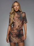 Get bold and fierce with our Trendy Leopard Print Shoulder Pad Mini Dress! This dress features a stylish leopard print and shoulder pads for a bold and confident look. Perfect for making a statement and standing out in any crowd. Be the trendsetter you've always wanted to be!