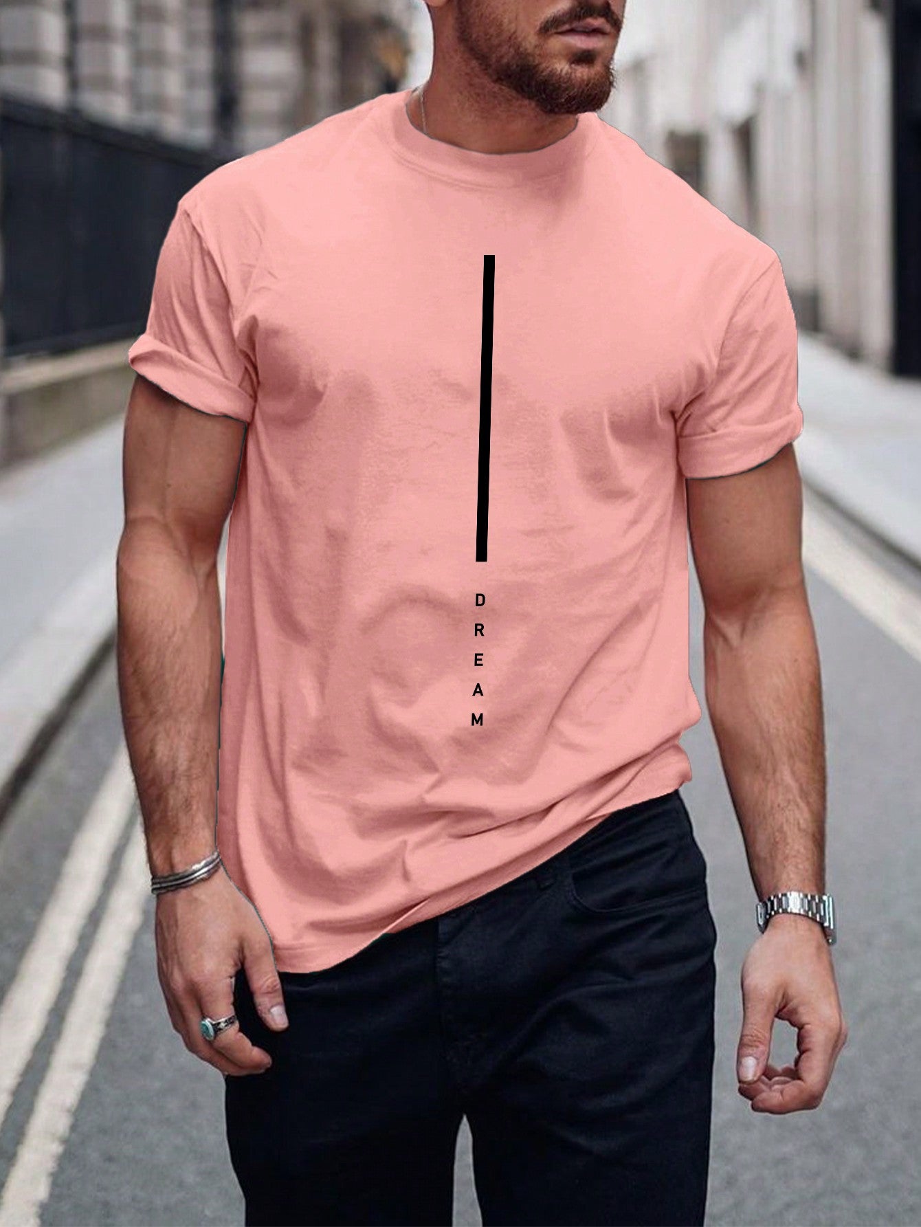 Get ready to elevate your everyday style with our Trendy Men's Casual Pink Letter Printed T-Shirt! This versatile t-shirt is perfect for any occasion, with its eye-catching letter print and comfortable fit. Rock it on the streets or at a casual hangout with friends. Stand out in style and make a statement effortlessly.