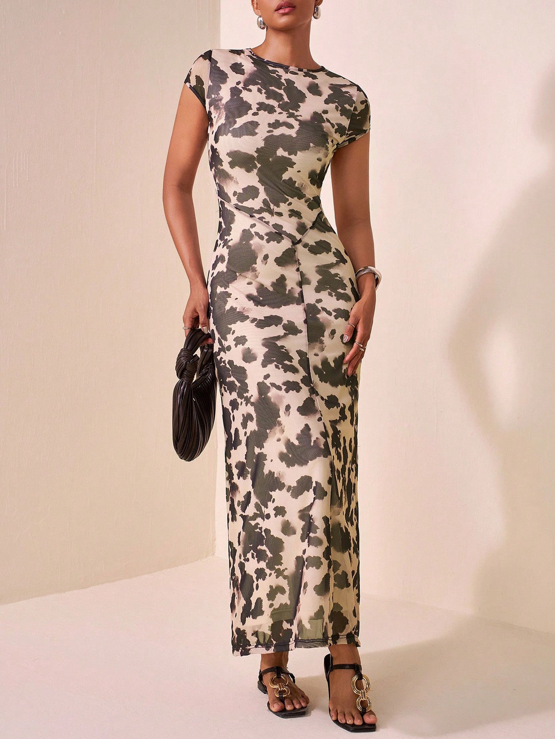 Step into fun with this Trendy Mesh Sheer Brown Polka Dot Cow Print Long Dress! Perfect for summer festivals or casual outings, its breezy mesh fabric keeps you cool while the playful cow print and polka dots turn heads. The long, flowing design adds effortless charm and lets you embrace every sunny moment in style.