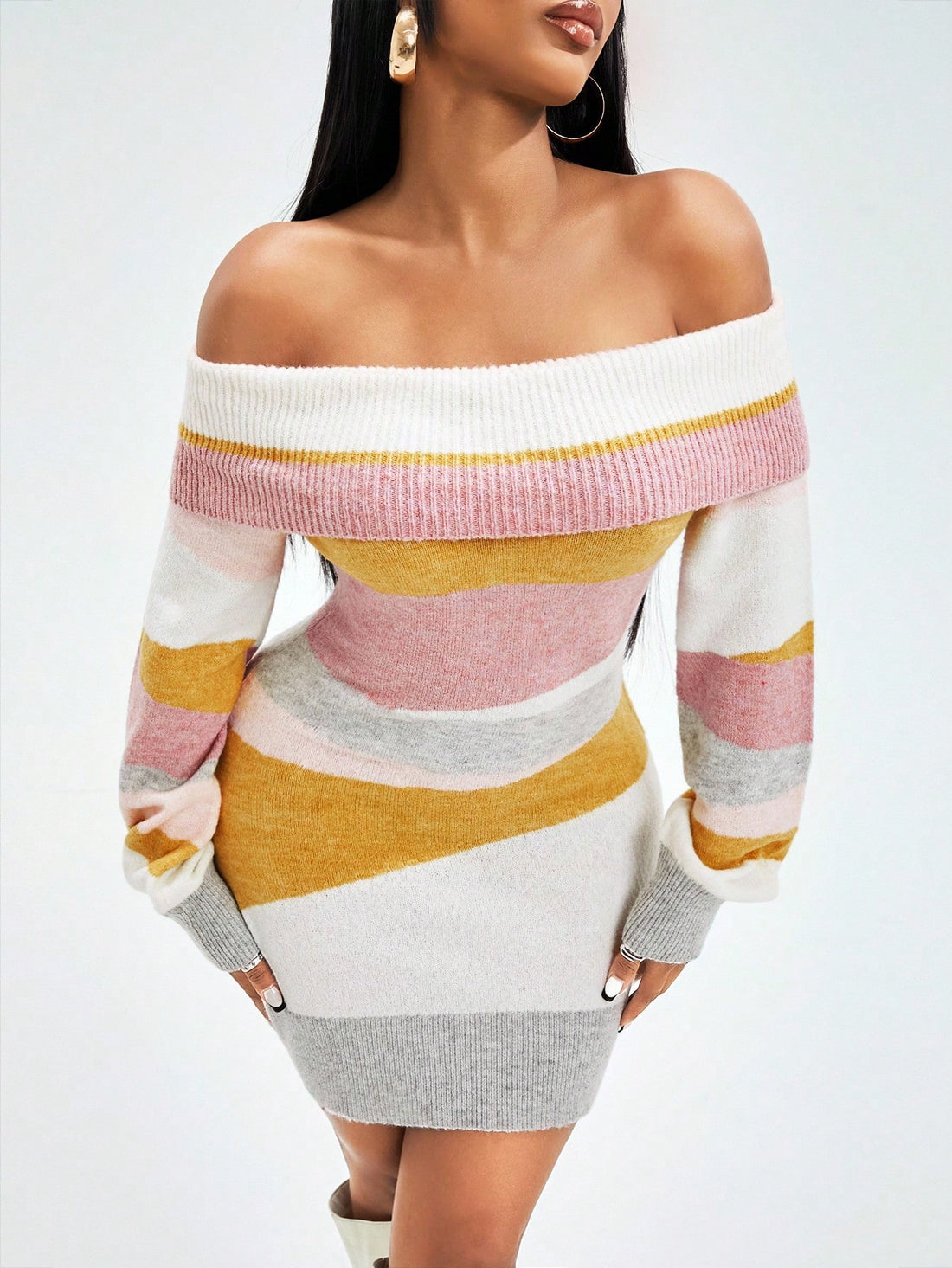 Elevate your cold-weather wardrobe with this show-stopping multicolor off-shoulder sweater dress! Featuring a playful mix of hues and a flirty off-shoulder neckline, it's the perfect piece to turn heads from September through February. The cozy knit fabric keeps you warm while the trendy silhouette keeps you looking effortlessly chic. Whether you're heading to brunch, a casual date, or a night out with friends, this versatile dress transitions seamlessly from day to night. Layer it with tights and boots for