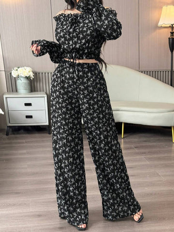 Make a statement with this effortless two-piece set that's perfect for turning heads. The off-shoulder cropped top flaunts a flirty silhouette that pairs beautifully with high-waisted wide-leg pants for a balanced, fashion-forward look. Whether you're hitting the town or keeping it casual, this combo delivers instant style without the fuss. Comfortable, versatile, and undeniably chic—your new go-to outfit awaits.