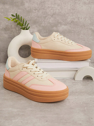 Step up your streetwear game with these trendy Pink & Yellow Striped Flatform Sneakers! The bold design is perfect for making a statement this Fall and Winter. Stay stylish and comfortable in these eye-catching kicks.