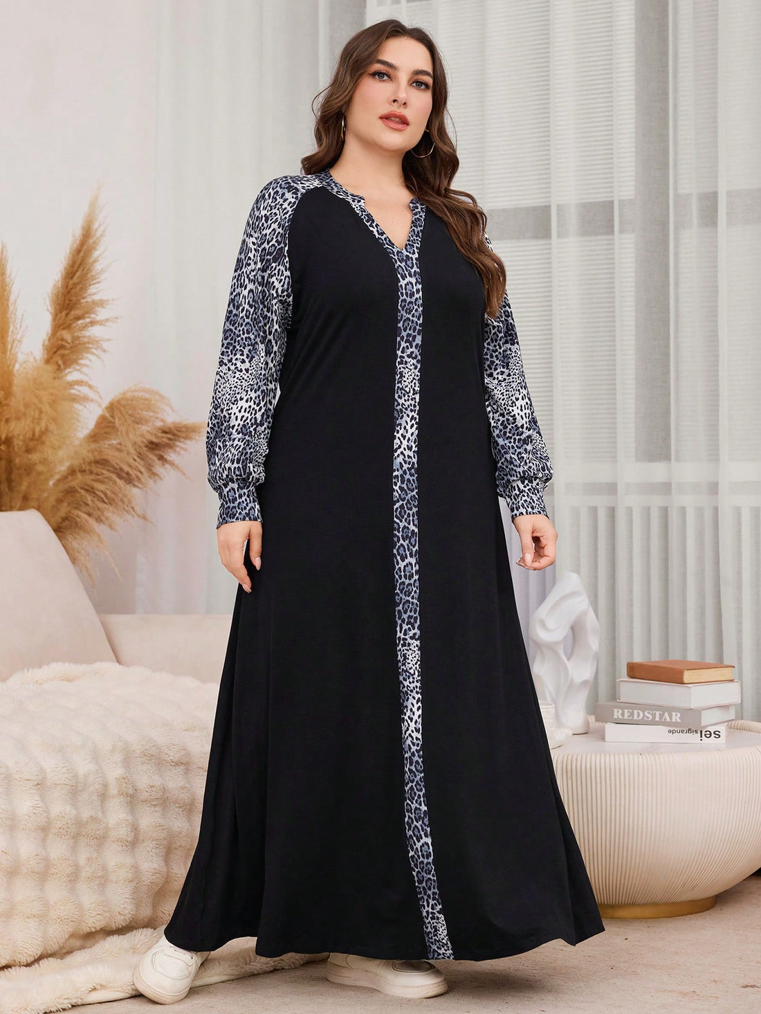 Unleash your wild side with this head-turning leopard print maxi dress! Designed specifically for plus-size queens, this long-sleeve knitted number brings Arabic-inspired elegance to your wardrobe. The floor-sweeping length creates dramatic flair while the cozy knit fabric hugs your curves in all the right places. Perfect for turning everyday moments into fabulous fashion statements!