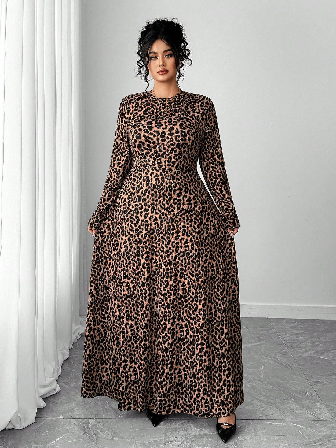 Unleash your wild side with this fabulous leopard print dress that's all about making a statement. Designed for the modern woman who refuses to blend in, this long-sleeve beauty combines comfort with undeniable style. The flowing silhouette flatters every curve while the classic leopard pattern adds that perfect touch of sass. Perfect for casual outings, weekend brunches, or whenever you want to feel confident and chic. Slip it on and let your personality roar.