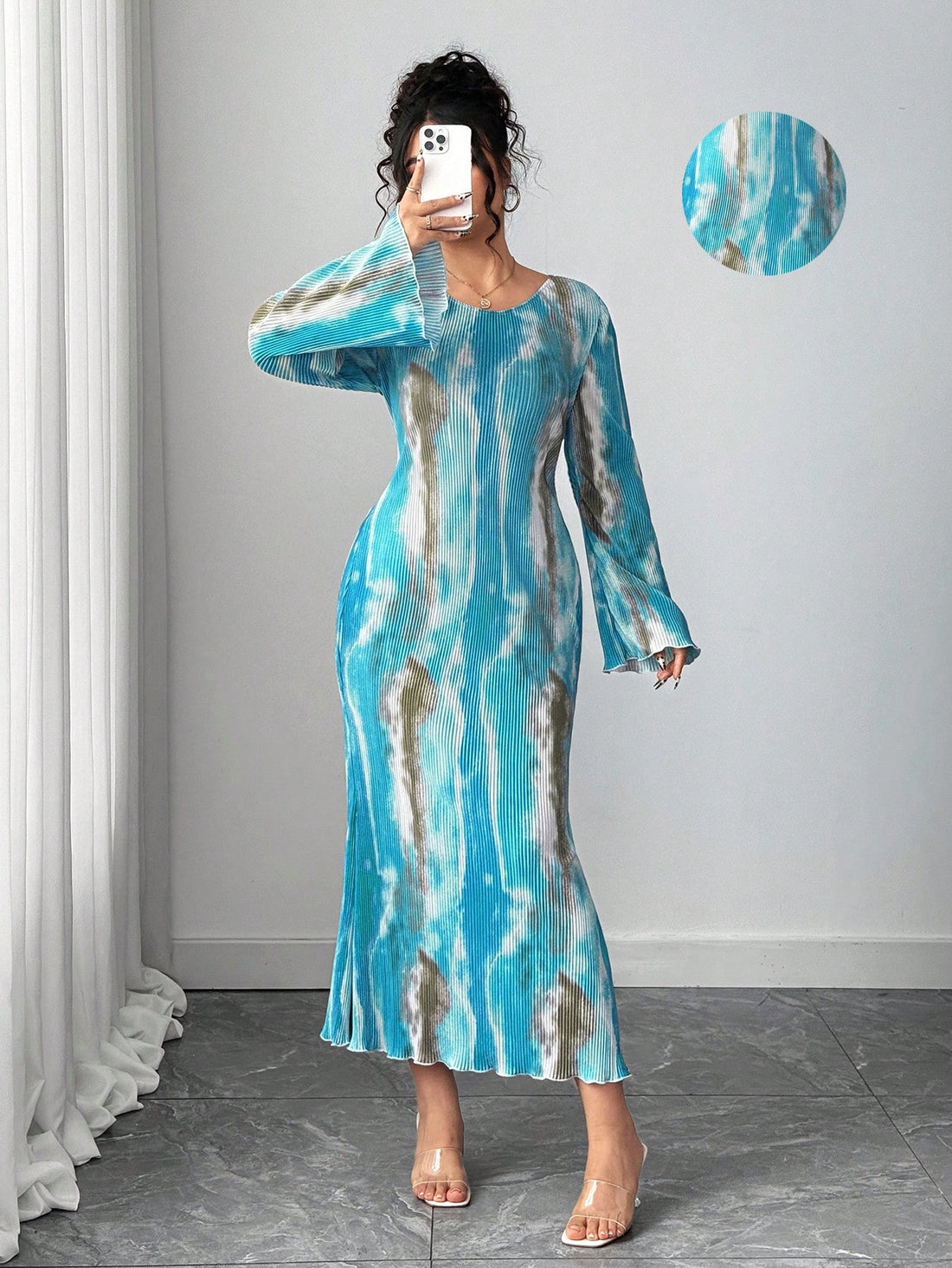 Make a splash this fall with our Trendy Plus Size Tie-Dye Mermaid Hem Dress! Featuring playful flare sleeves and a flattering mermaid hem, this dress effortlessly combines comfort and style. Perfect for cozy days or festive outings, its vibrant tie-dye pattern adds a fun, eye-catching twist to your seasonal wardrobe. Embrace your curves and let your style shine!