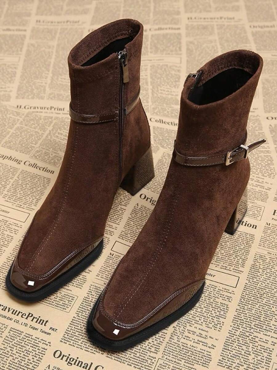 Step into timeless elegance with these show-stopping wine red boots that blend vintage charm with modern edge. Featuring a sturdy chunky heel for all-day comfort and confidence, these short boots showcase classic French-British styling that never goes out of fashion. The convenient side zipper makes slipping them on effortless, while the decorative buckle strap adds that perfect touch of retro flair. Whether you're channeling 70s vibes or adding a sophisticated pop of color to your everyday look, these vers