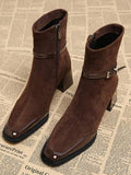 Step into timeless elegance with these show-stopping wine red boots that blend vintage charm with modern edge. Featuring a sturdy chunky heel for all-day comfort and confidence, these short boots showcase classic French-British styling that never goes out of fashion. The convenient side zipper makes slipping them on effortless, while the decorative buckle strap adds that perfect touch of retro flair. Whether you're channeling 70s vibes or adding a sophisticated pop of color to your everyday look, these vers