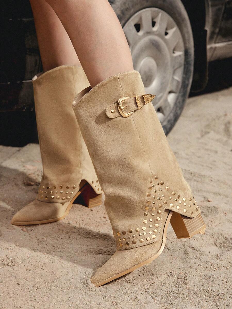 Step into the spotlight with these edgy rivet-embellished punk cowboy boots that blend classic Western vibes with rebellious attitude. Featuring bold metal accents and a sleek silhouette, they're your go-to choice for turning heads at dates, parties, and music festivals. Whether you're channeling rock-and-roll energy or adding an unexpected twist to your everyday look, these boots deliver serious style with every stride. Comfortable enough for all-night dancing, bold enough to make a statement—because why b