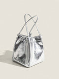 Add a dash of retro flair to your outfit with this Trendy Silver Y2K Crossbody Handbag. Its shiny square shape and winged lunchbox design make it a fun, eye-catching accessory perfect for carrying your essentials hands-free. Lightweight and stylish, it’s the perfect companion for those who love a playful nod to early 2000s fashion.