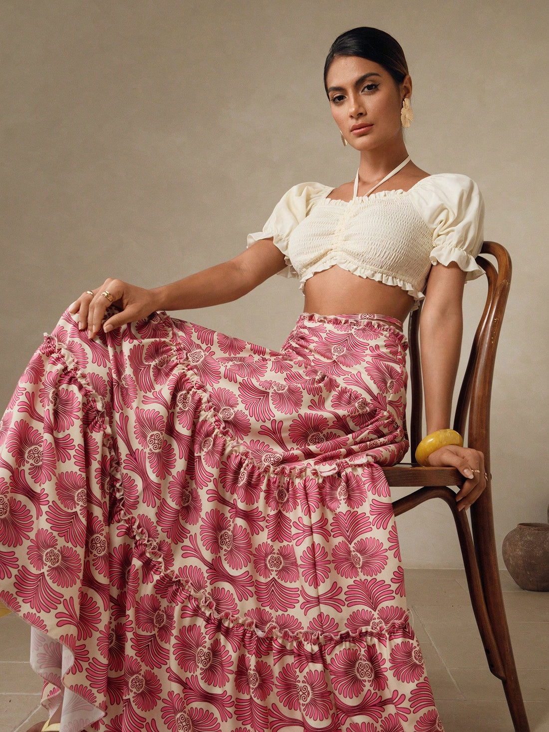 Make a splash this season in our chic sleeveless swim set! Featuring a fitted solid top paired with a flirty ruffle hem skirt, this two-piece combo delivers effortless style for poolside lounging or beach days. The classic silhouette flatters every figure while the playful ruffles add that perfect touch of fun. Mix, match, or wear together—your summer wardrobe just got a major upgrade. Dive into style!