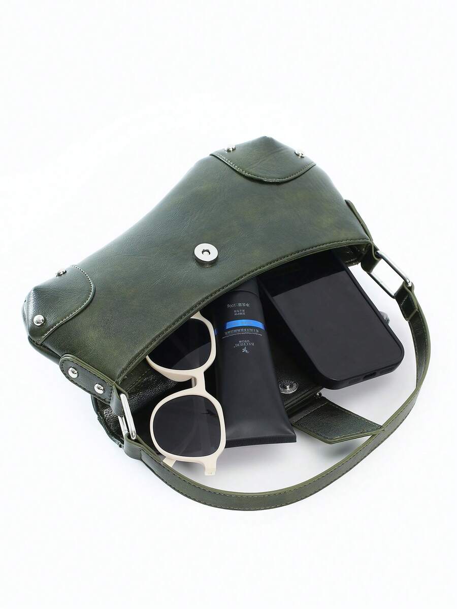 Step out in style with this Trendy Snake Print Underarm Bag, channeling chic motorcycle vibes! Perfect for any occasion, this hobo handbag adds a bold, edgy touch to your outfit while keeping your essentials close. Its sleek design and striking snake pattern make it a fun and fashionable companion for day or night adventures.