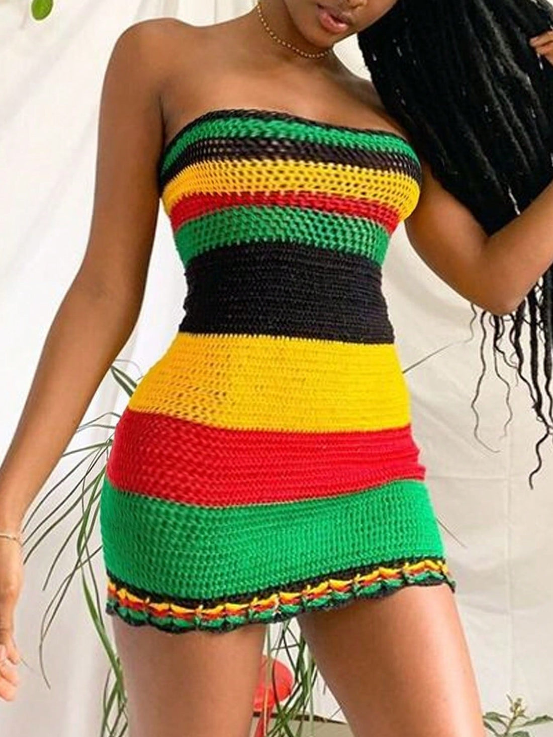 Get ready for summer with this trendy and playful Striped Color Block Knitted Sweater Crochet Dress! Perfect for your vacation, this dress will keep you cool and stylish. Enjoy a unique look with its fun stripes and crochet detailing. Don't miss out on this must-have piece!