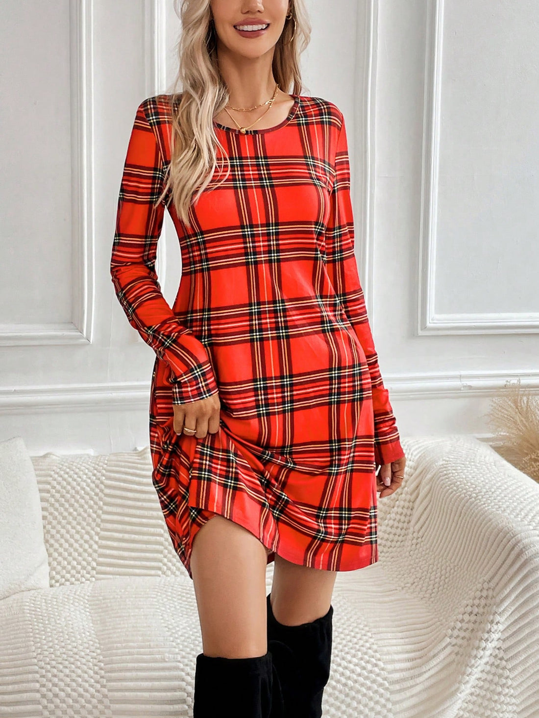 This trendy tartan tee dress effortlessly combines style and versatility for every occasion. Made with high-quality materials, it offers a comfortable and flattering fit. Whether dressed up or down, this dress is a must-have for any fashion-forward wardrobe. Add a touch of effortless style to your wardrobe with this must-have piece.