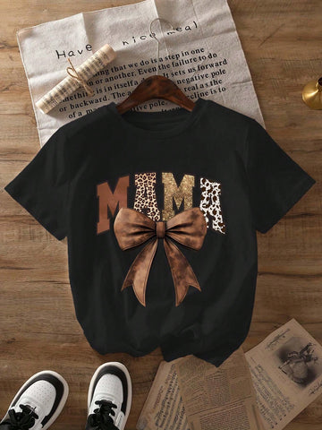 Express your cowgirl mom style with this trendy graphic t-shirt. Perfect for spring and summer, this casual top will add some flair to any outfit. Yeehaw!
