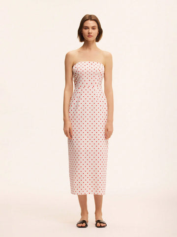 Step into summer with this playful bandeau mini dress, inspired by chic French resort style. Featuring a flirty polka dot print, its strapless design highlights your shoulders while the mini length adds a fun, youthful vibe. Perfect for sunny days and lively nights, this dress brings effortless charm and a touch of whimsy to your wardrobe.