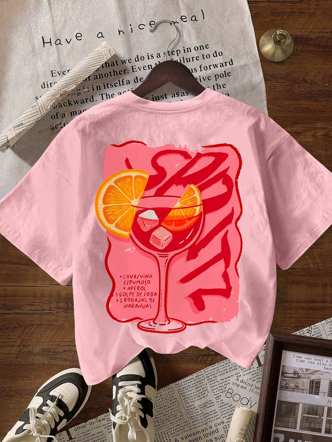 Rock your back-to-school wardrobe with this effortlessly cool round neck tee! Perfect for mixing and matching with your favorite jeans, skirts, or shorts, this casual short-sleeve essential keeps you comfy and stylish all day long. The relaxed fit and timeless design make it a go-to piece that works for class, hangouts, or weekend adventures. Whether you're layering it up or wearing it solo, this versatile tee is your new fashion friend!