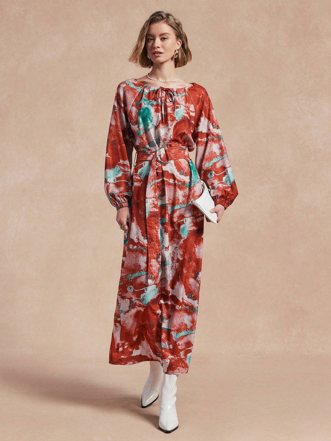 Get ready to turn heads with our trendy tie-dye lantern sleeve dress! This casual dress is perfect for autumn fashion and will add a playful touch to your wardrobe. With its unique tie-dye design and stylish lantern sleeves, you'll be sure to stand out in the crowd. Don't miss out on this must-have piece!