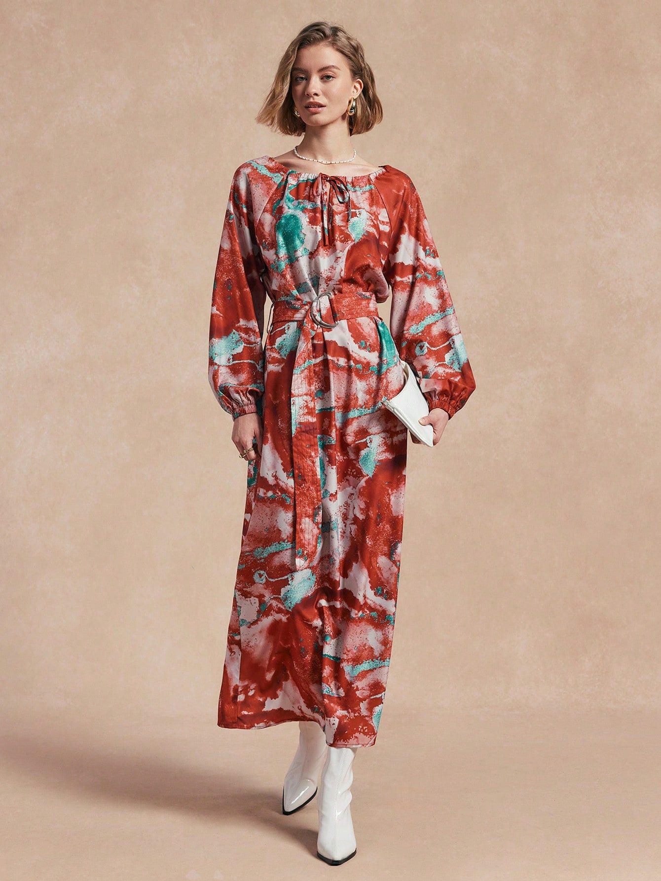 Get ready to turn heads with our trendy tie-dye lantern sleeve dress! This casual dress is perfect for autumn fashion and will add a playful touch to your wardrobe. With its unique tie-dye design and stylish lantern sleeves, you'll be sure to stand out in the crowd. Don't miss out on this must-have piece!