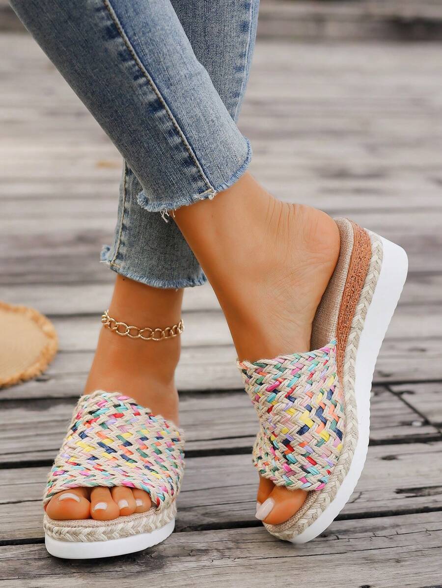 Step into summer fun with these colorful woven wedge heel platform sandals! Designed for stylish comfort, their vibrant hues and playful texture add a pop of personality to any outfit. The wedge heel gives you a lift while keeping your feet cozy all day long. Perfect for sunny days, casual outings, or dancing the night away in style!