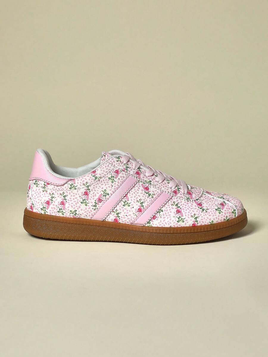 Step into style and comfort with our Trendy Floral Print Pink Sneakers! These vibrant kicks will add a pop of color to any outfit, while providing all-day comfort for your feet. Perfect for the fashion-forward woman who wants to make a statement (in a good way) with her footwear.