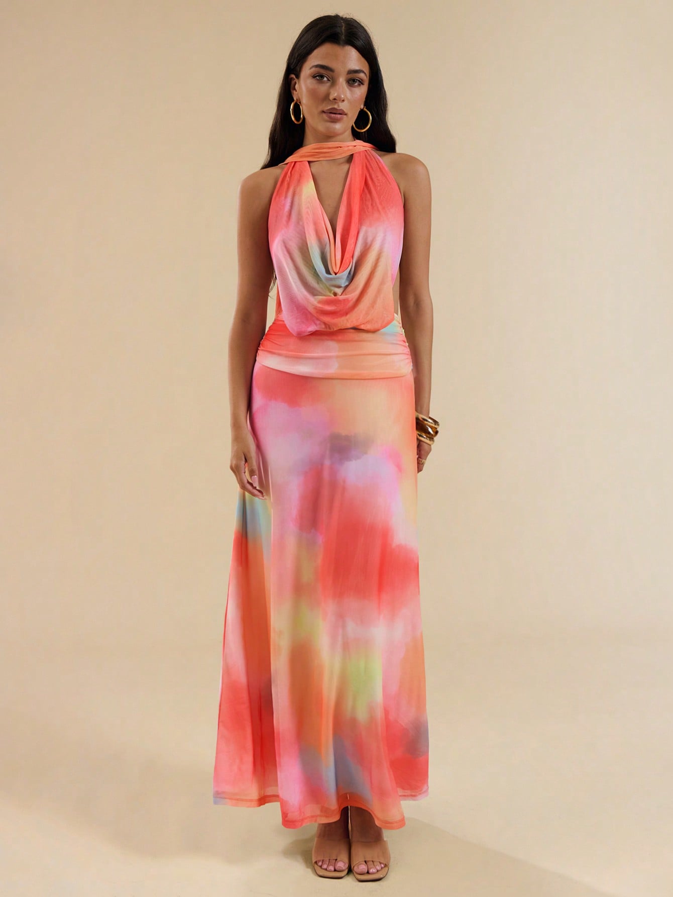 Flaunt your summer style in this flirty halter neck dress that's ready for all your warm-weather adventures! The breezy silhouette keeps you cool while turning heads at beach parties, rooftop gatherings, or casual brunches. Slip it on, add your favorite accessories, and voilà – instant summer goddess vibes without even trying!