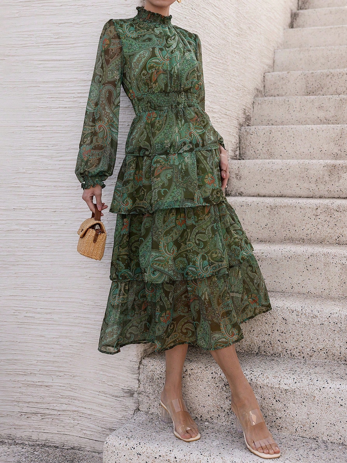 Unleash your inner fashionista with our trendy women's dress. Its lantern sleeves and paisley print will have you turning heads on your next vacation. Step out in style and make a statement with the perfect outfit for any getaway. Pack it now and thank us later!
