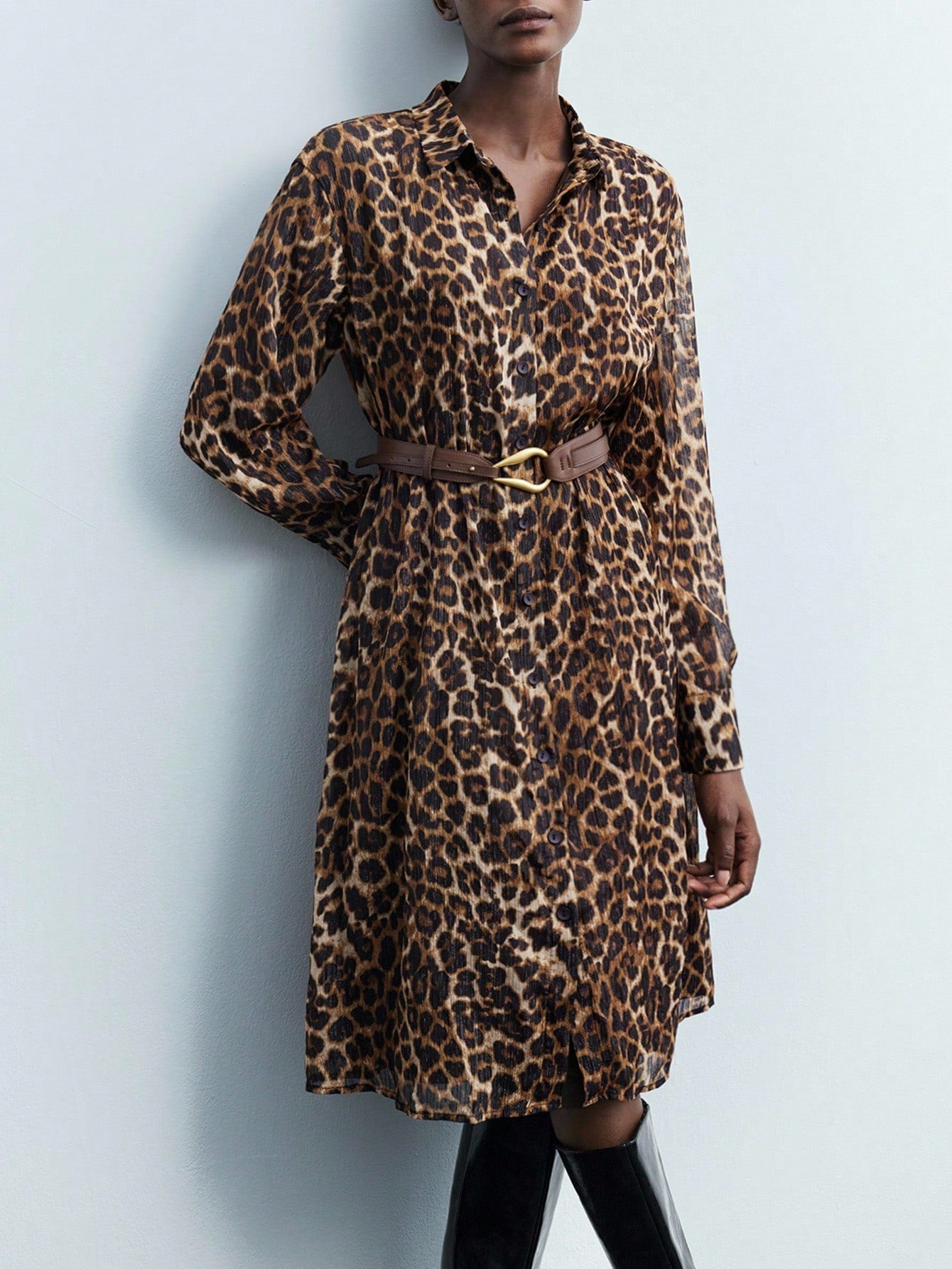 Step out in style with this trendy leopard print shirt dress, perfect for turning heads during your daily commute or casual outings. Its playful pattern adds a wild touch to your wardrobe, while the comfortable fit lets you move freely from morning meetings to weekend brunches. Embrace boldness with an easygoing vibe!