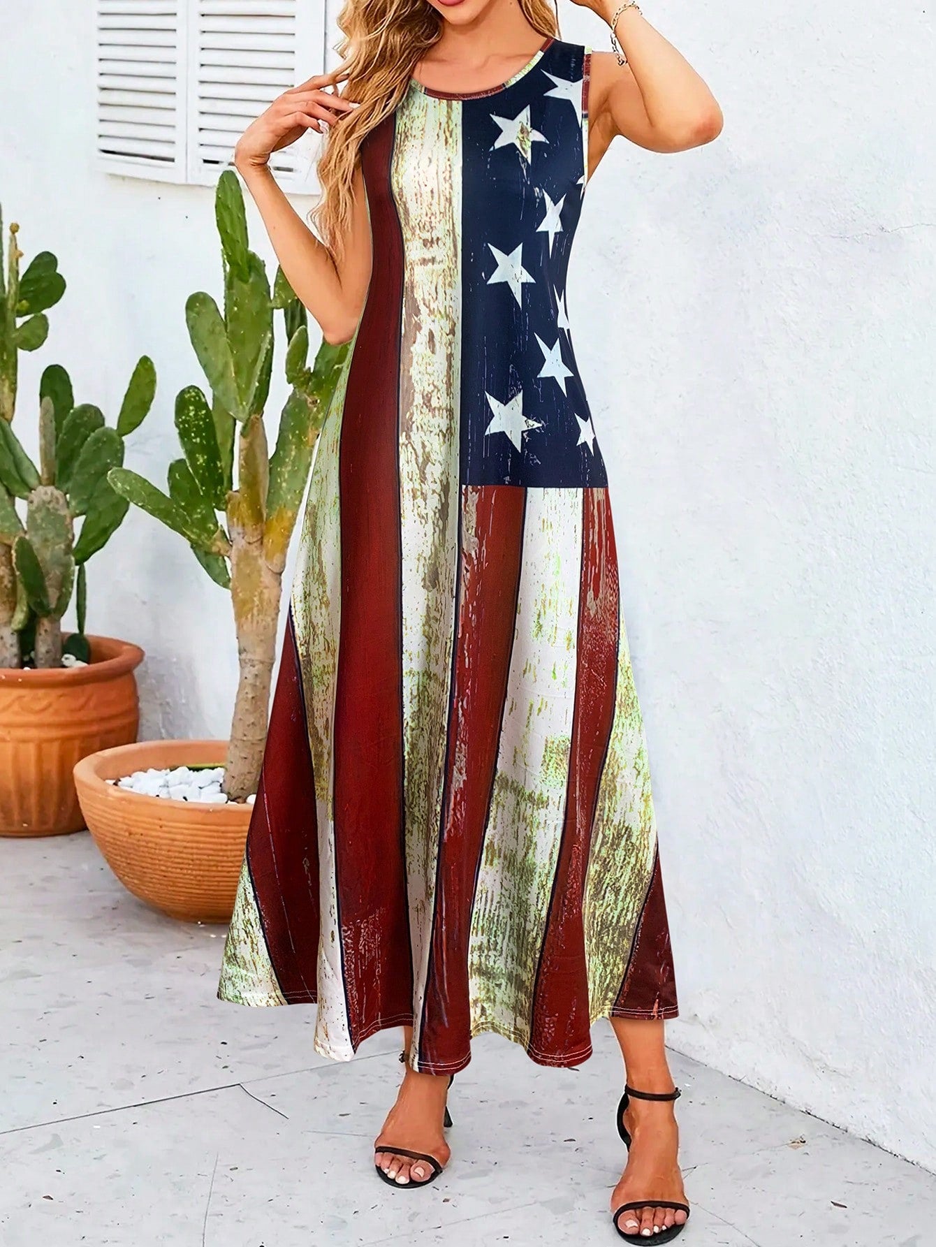 Celebrate summer in style with this trendy women's long tank dress featuring a bold American flag print. Its lightweight, flowy design keeps you cool and comfortable whether you're lounging on vacation or out and about daily. Easy to dress up or down, this playful piece adds a patriotic pop to your wardrobe while letting you move freely all day long. Perfect for sunny days and star-spangled nights!