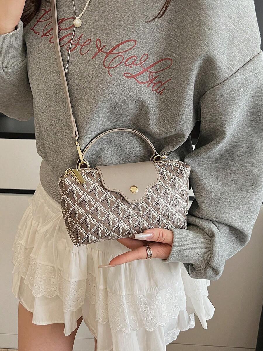 Elevate your everyday look with this Trendy Women's Minimalist Dumpling Bag. Crafted from lightweight nylon, it’s ready to keep up with your busy office days and college adventures. Its sleek dumpling shape adds a fun twist to minimalist style, while spacious compartments keep your essentials organized. Whether you’re rushing to class or heading into meetings, this versatile handbag is your new go-to for effortless, playful chic.