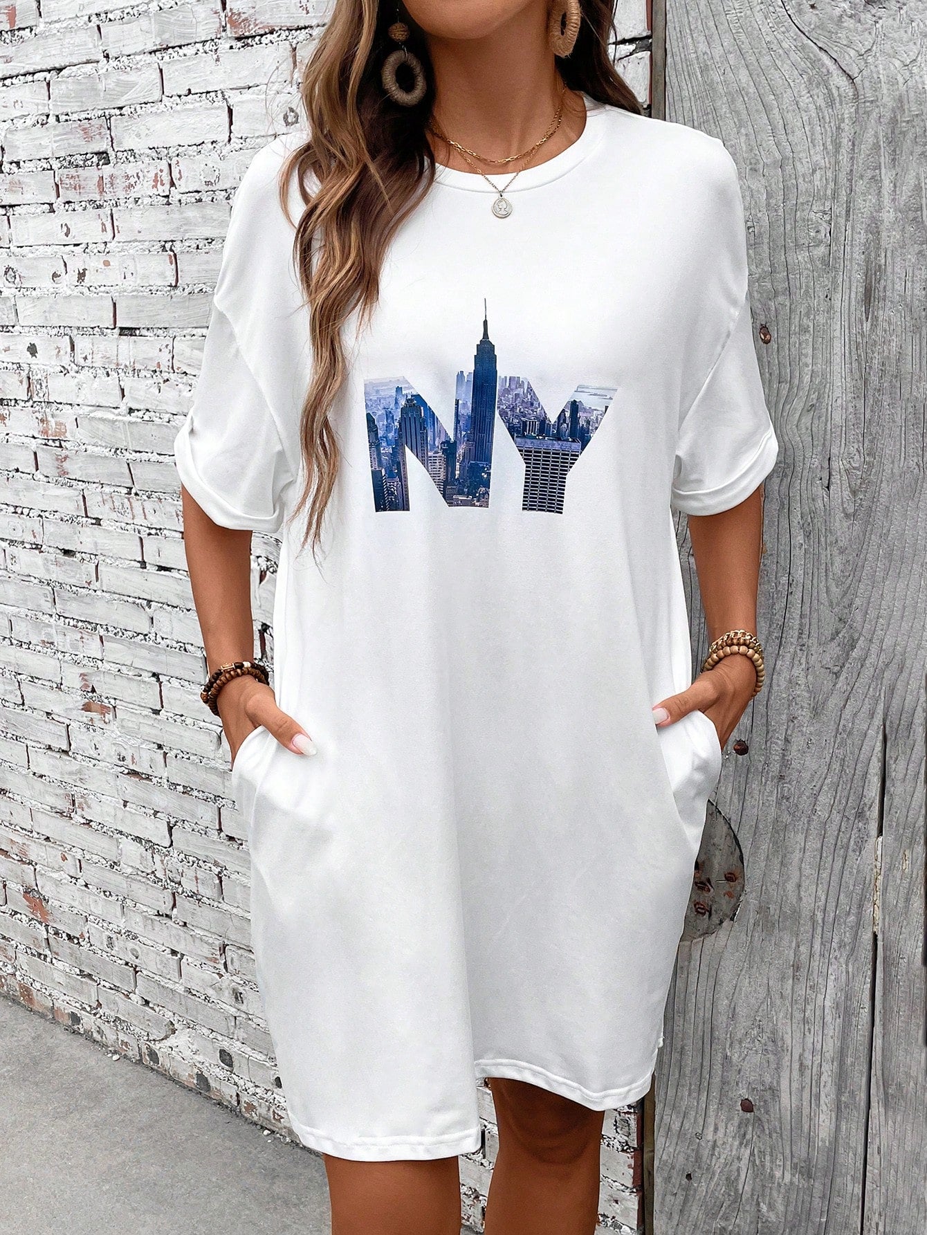 Get the ultimate effortless style with our Trendy Women's NY Print Short Sleeve Dress! The NY print adds a touch of urban cool to this dress, making it perfect for any occasion. With short sleeves, it's perfect for summer or layering in colder weather. Step up your fashion game with this must-have dress!