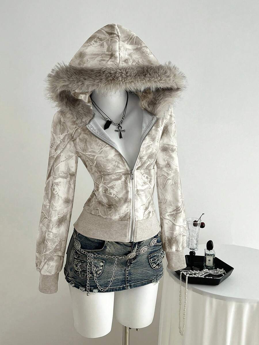 Front view of beige camo zip-up hoodie with faux-fur trimmed hood and ribbed cuffs