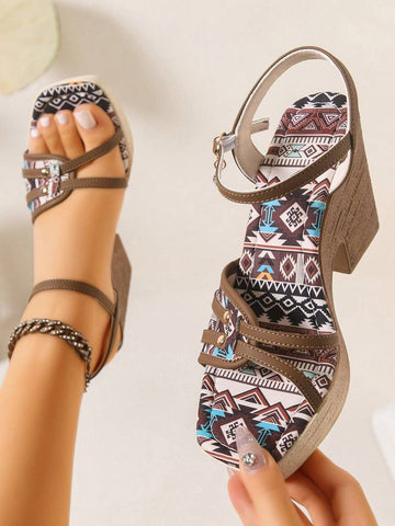 Brown boho wedge sandal worn on foot with tribal print footbed