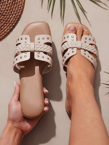 Step into summer with these trendy slip-on flat sandals, adorned with stylish studs that add a playful edge to any outfit. Perfect for effortless chic, they combine comfort and flair, making every stroll feel like a runway moment. Easy to wear and fun to flaunt, these sandals are your go-to for sunny days and casual adventures.