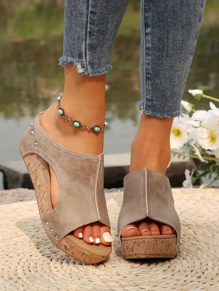 Step out in style with these trendy women's waterproof high-heel peep-toe sandals, perfect for outdoor adventures. Designed to keep your feet dry and comfortable, these wedges add height and flair while embracing a playful vibe. Available in plus sizes, they celebrate every curve with a chic, supportive wedge that turns heads wherever you go. Embrace fun and function with footwear that’s as bold as you are!