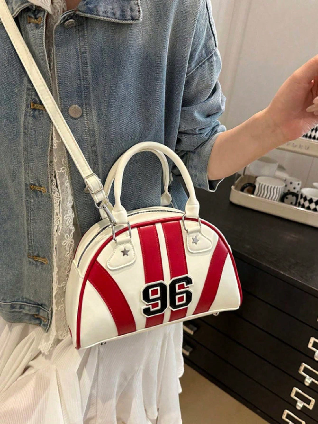 Add a dash of retro flair to your daily look with this Trendy Y2K Bowling Bag designed just for teens. Perfect for school or streetwear, it easily switches between handheld and shoulder styles—making it as versatile as your day. Compact yet spacious enough to carry your essentials, this bag brings cool vibes wherever you go. Get ready to turn heads and keep your style game strong!