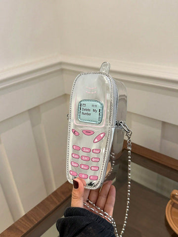 Add some Y2K flair to your style with our trendy crossbody bag. The included creative phone pouch keeps your phone close and adds a unique touch. Perfect for the bold and playful fashionista.